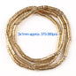 Gold beads on a white background with text indicating size and quantity.
