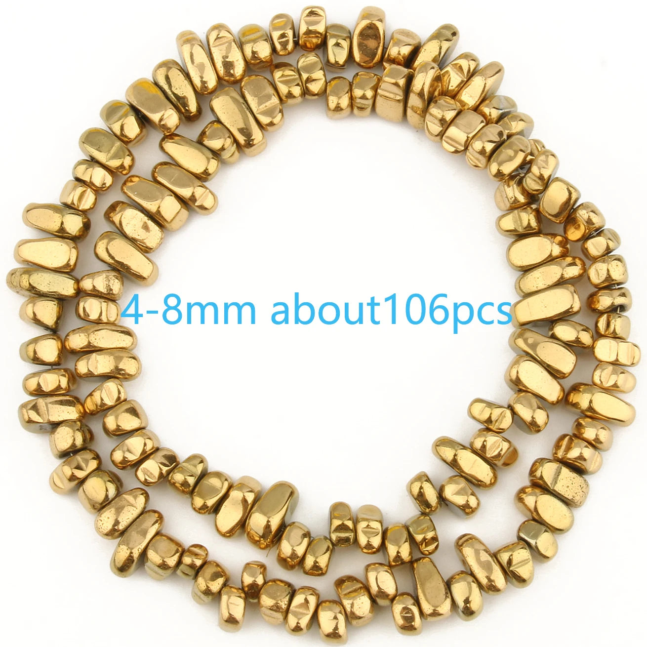 Gold beads arranged in a circular pattern on a white background