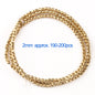 Gold beaded necklace with measurement text on a white background