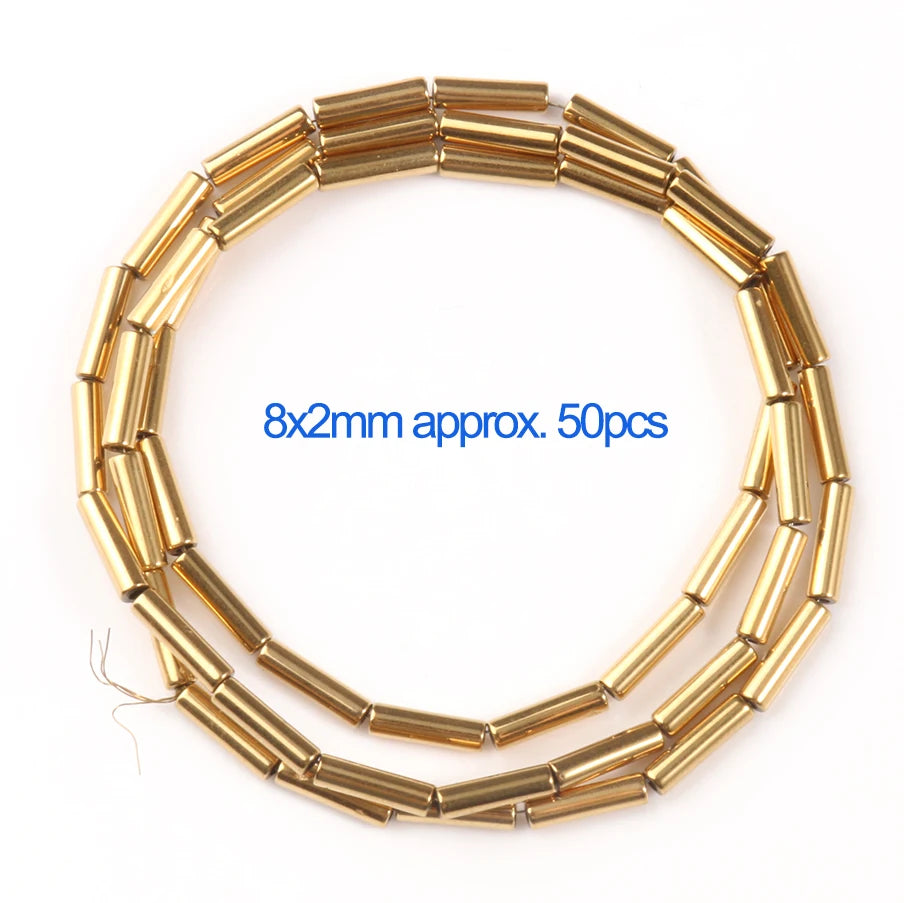 Gold cylindrical beads on a white background with text indicating size and quantity.