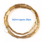 Gold cylindrical beads on a white background with text indicating size and quantity.
