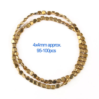 Gold beaded necklace with measurement text on a white background