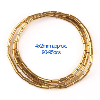 Gold cylindrical beads on a white background with text indicating size and quantity.