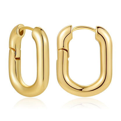 Gold hoop earrings on a white background