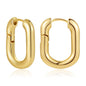 Gold hoop earrings on a white background