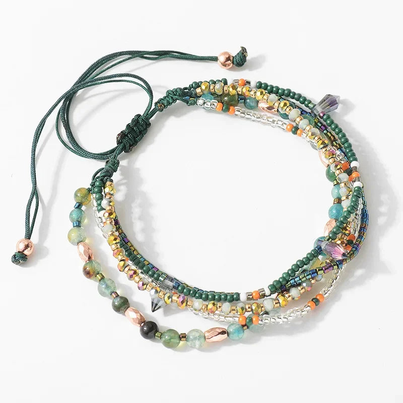 Multistrand beaded bracelet with colorful beads on a white background