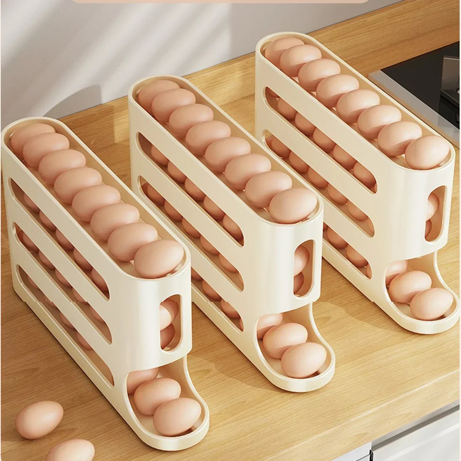 Three egg storage containers with eggs on a wooden surface