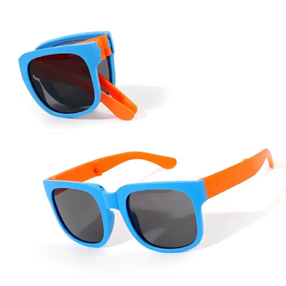 Sunglasses with blue frames and orange arms on a white background