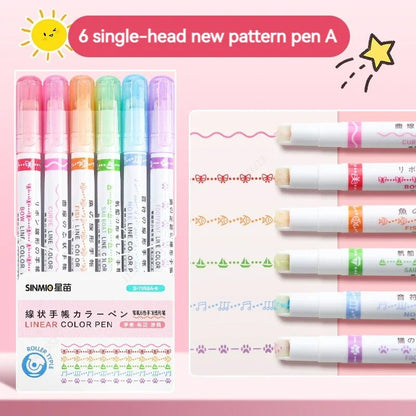 Set of colorful pens with packaging on a pink background