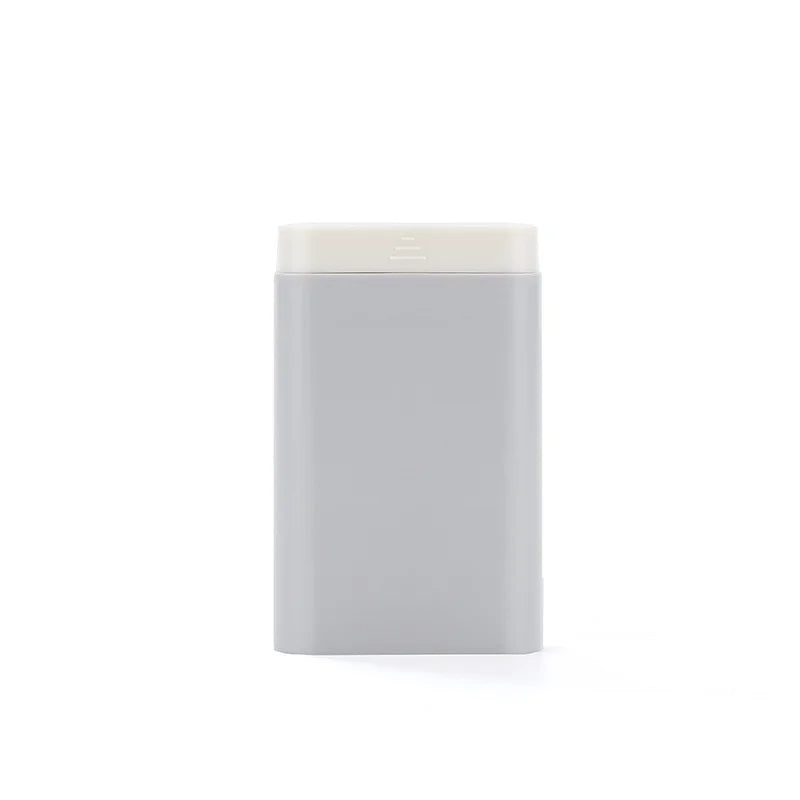 Rectangular gray product with white top on a white background