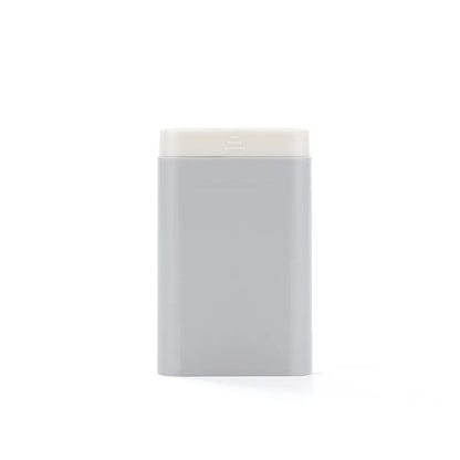 Rectangular gray product with white top on a white background
