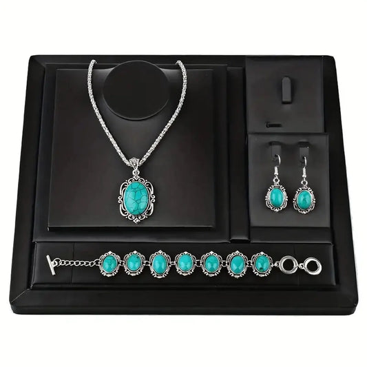 Jewelry set with turquoise stones on a black display box