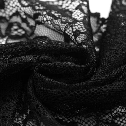 Close-up of black lace fabric with intricate patterns