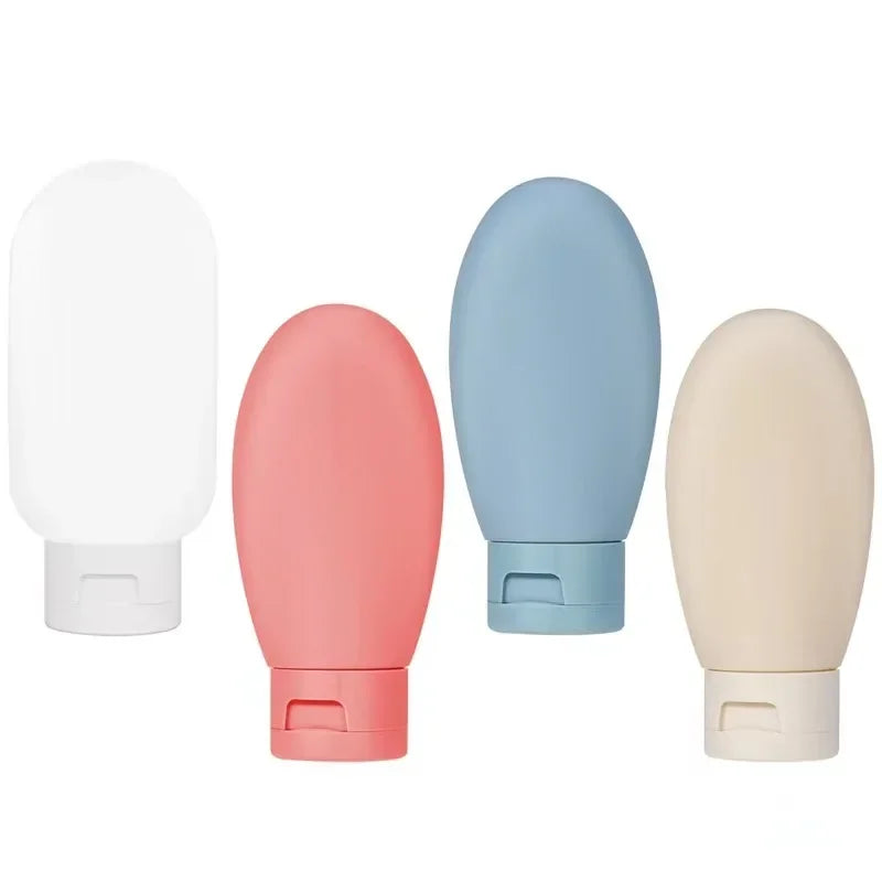 Four colorful foam bottles on a white background