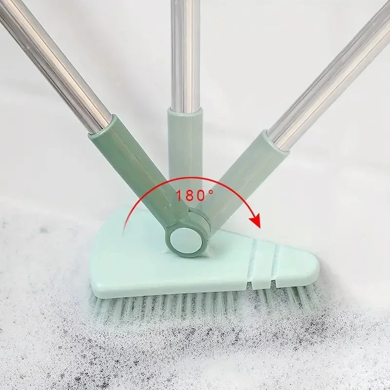 Green cleaning brush with adjustable head on a white background
