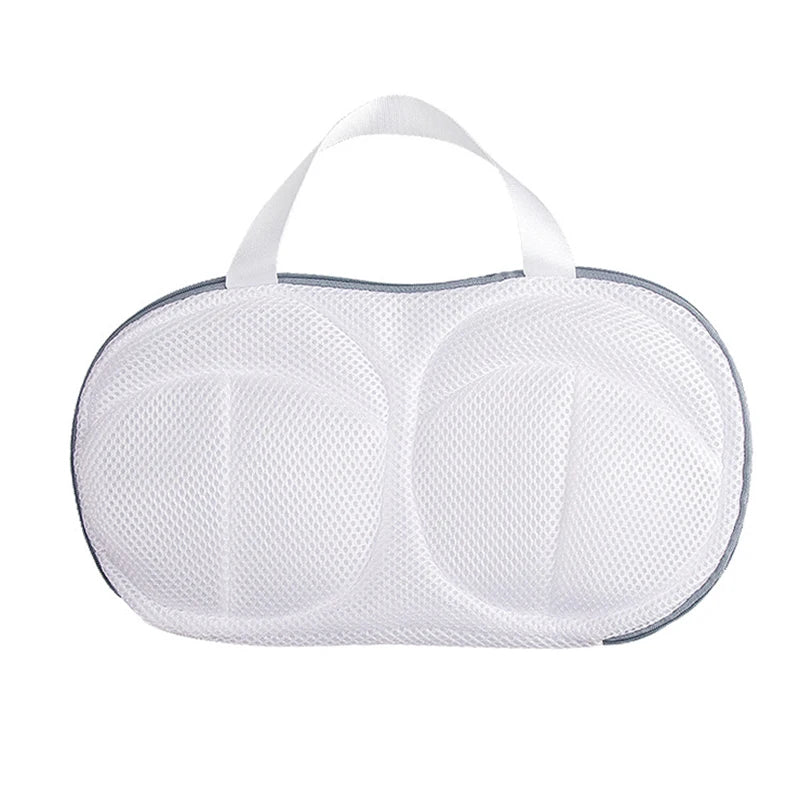 White mesh laundry bag with a handle on a white background