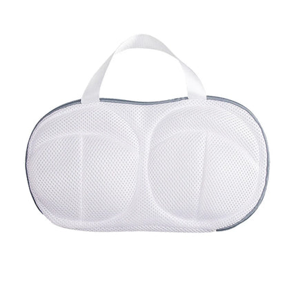 White mesh laundry bag with a handle on a white background