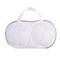 White mesh laundry bag with a handle on a white background