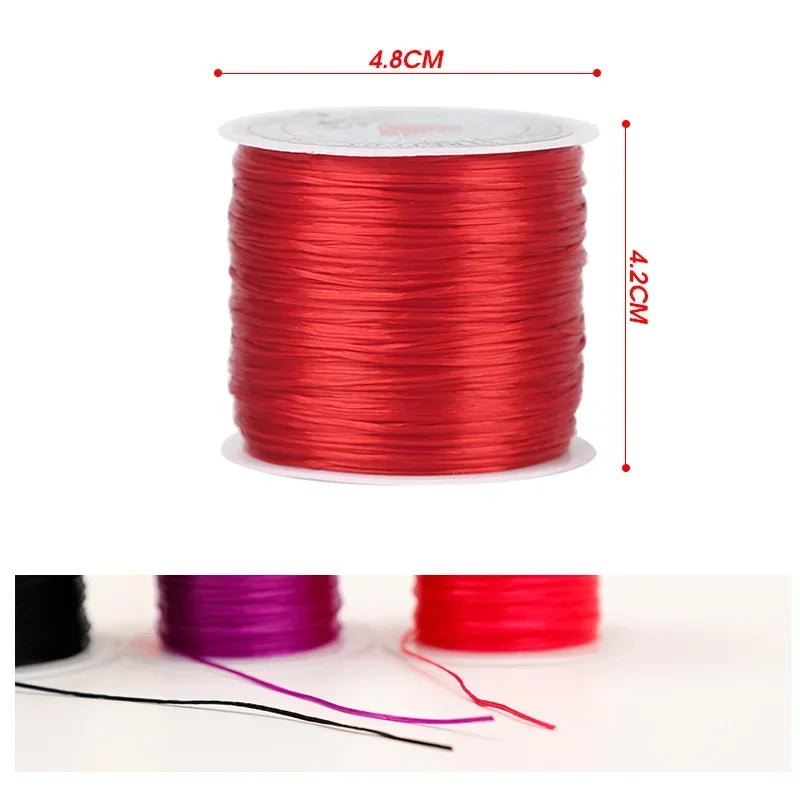 Red spool of wire with measurements on a white background