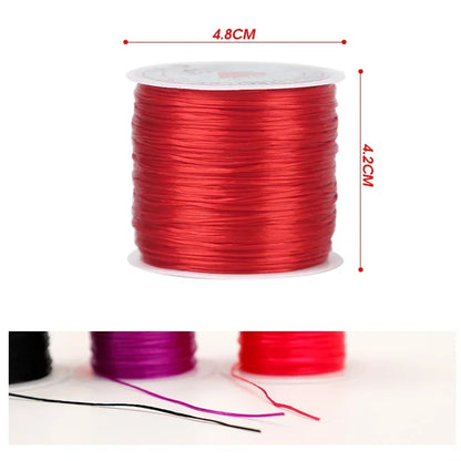 Red spool of wire with measurements on a white background