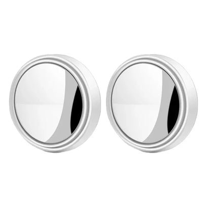 Pair of silver round earrings on a white background