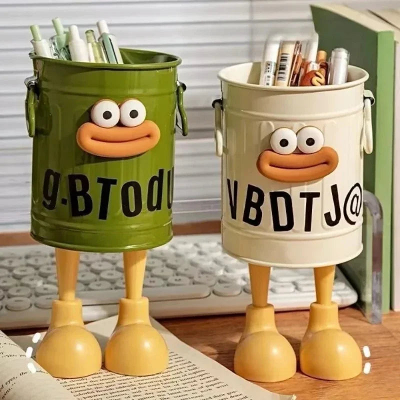 Two cartoon-style buckets with faces and legs on a desk.