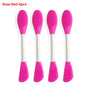 Four rose red silicone brushes with white handles on a white background.