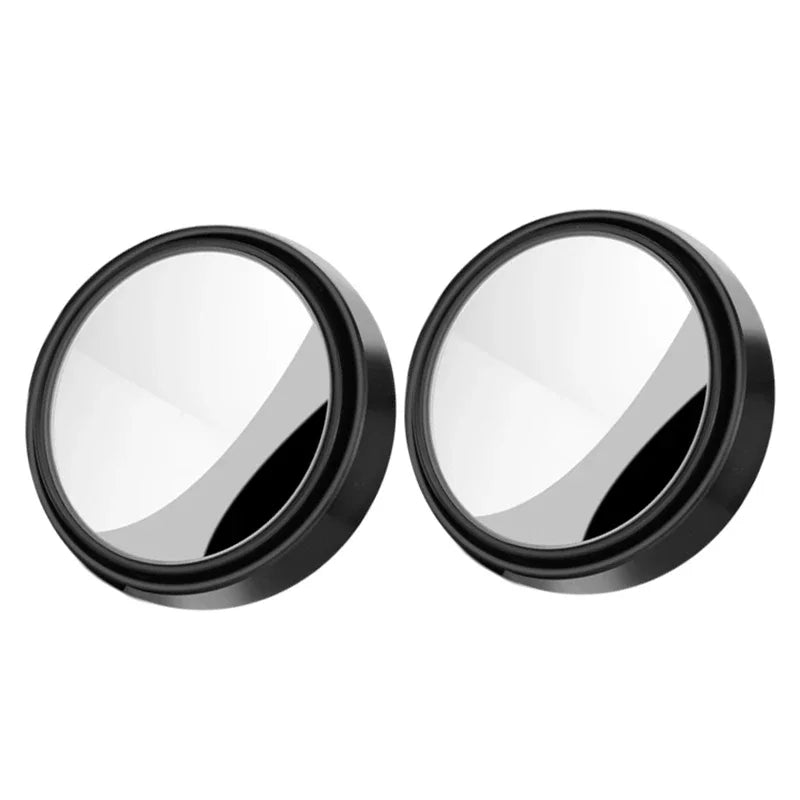 Two round metallic objects with black frames on a white background