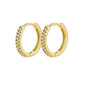 Gold hoop earrings with embedded stones on a white background