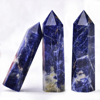 Three marbled stone towers on a white background