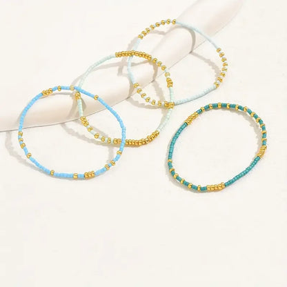 4-Piece Turquoise Seed Bead Bracelet Set – Boho Gold-Plated Elastic Jewelry