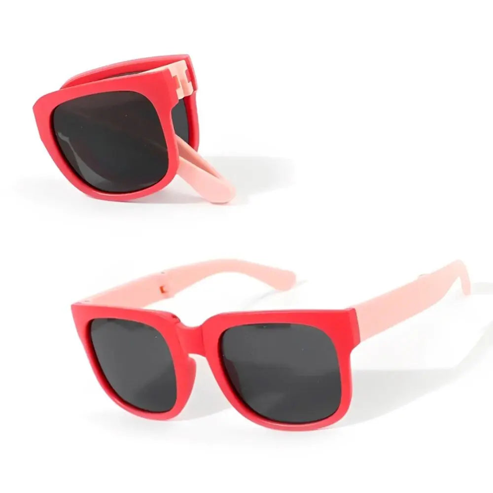 Sunglasses with red and pink frames on a white background