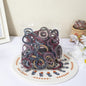 Packaged hair ties on a decorative plate with a neutral background