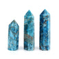Three blue crystal points on a white background