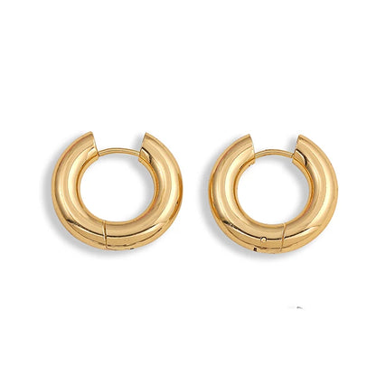 Pair of gold hoop earrings on a white background