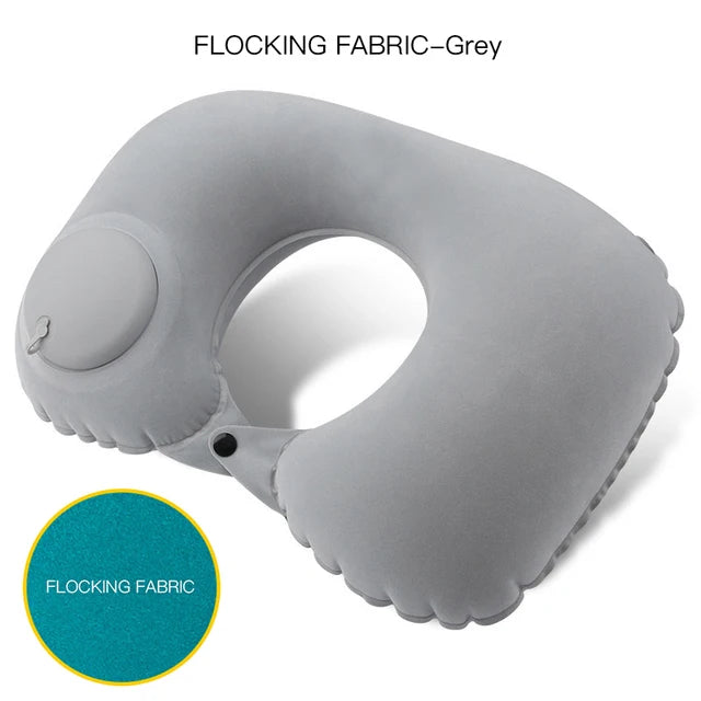 Gray inflatable neck pillow with flocking fabric feature on a white background