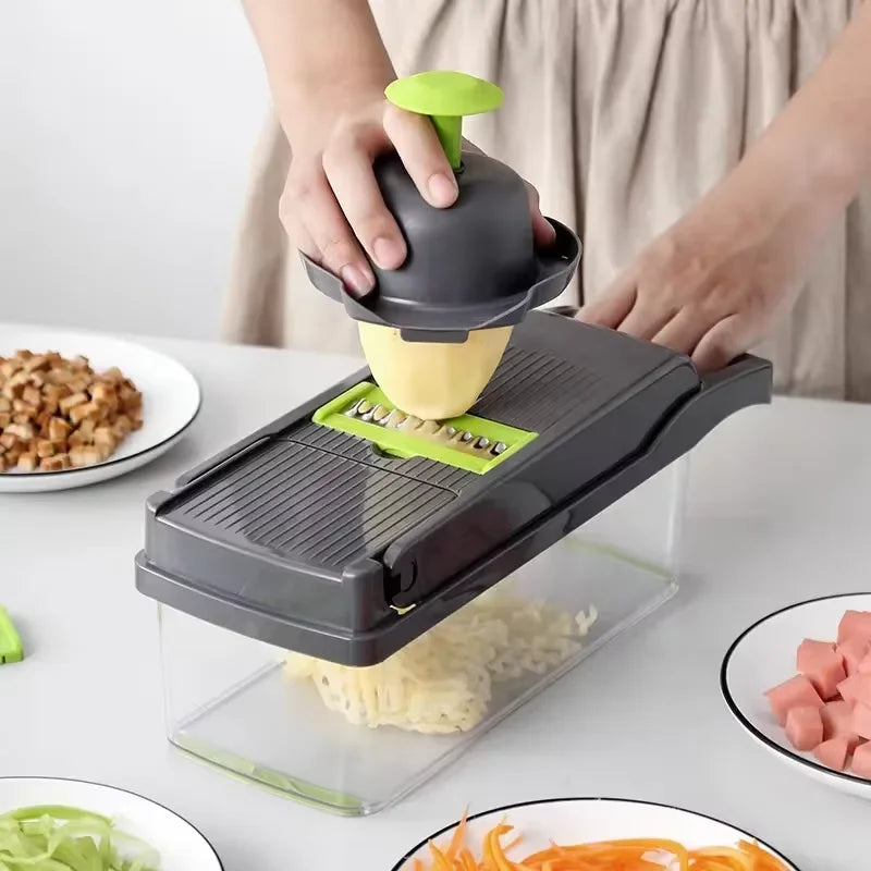 Person using a mandoline slicer to slice vegetables on a kitchen counter.