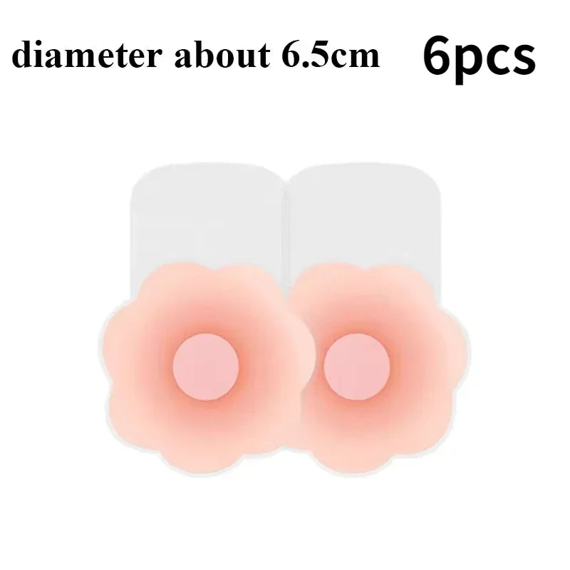 Set of six peach-colored adhesive patches with a diameter of about 6.5cm on a white background.