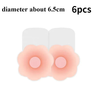 Set of six peach-colored adhesive patches with a diameter of about 6.5cm on a white background.