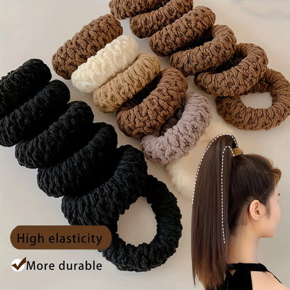 Set of brown and black textured hair ties with a woman wearing one, on a light background.