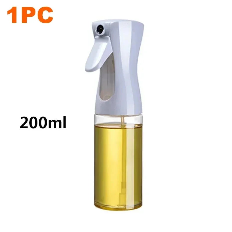 Spray bottle with oil, labeled '1PC' and '200ml', on a white background