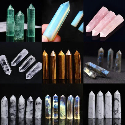 Collage of various crystal and crystal-like objects on a reflective surface with a dark background.