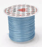 Spool of light blue thread with a clear label on a white background