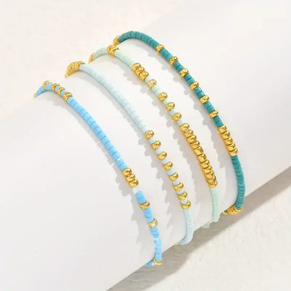 4-Piece Turquoise Seed Bead Bracelet Set – Boho Gold-Plated Elastic Jewelry