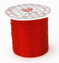 Spool of red thread with a clear label on a white background