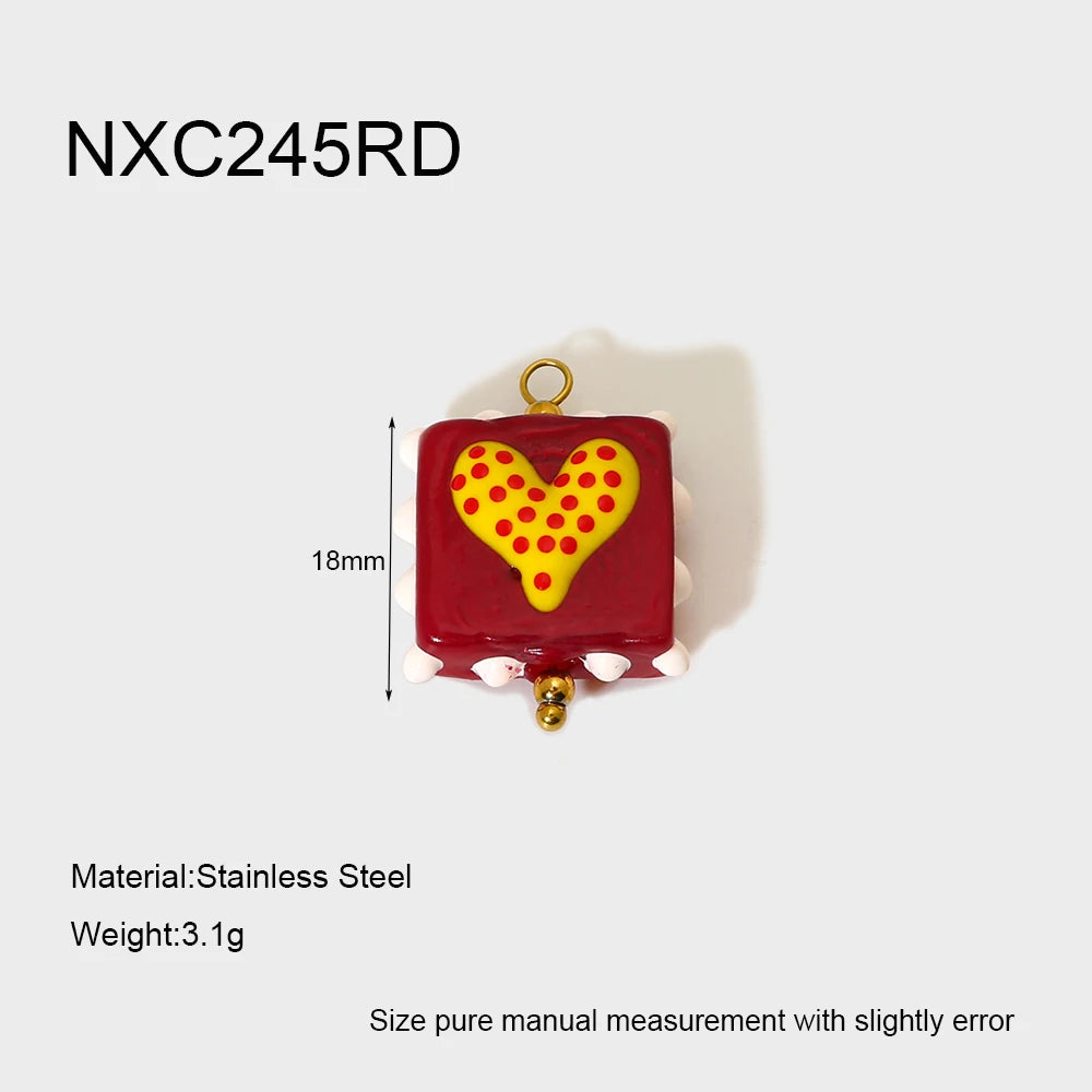 Red pendant with a yellow heart design on a white background, featuring dimensions and material information.