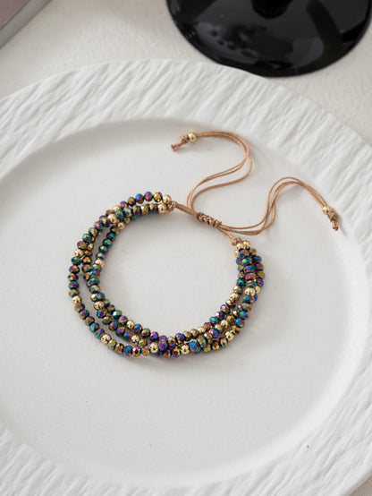 Beaded bracelet on a textured white surface