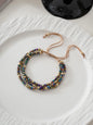 Beaded bracelet on a textured white surface