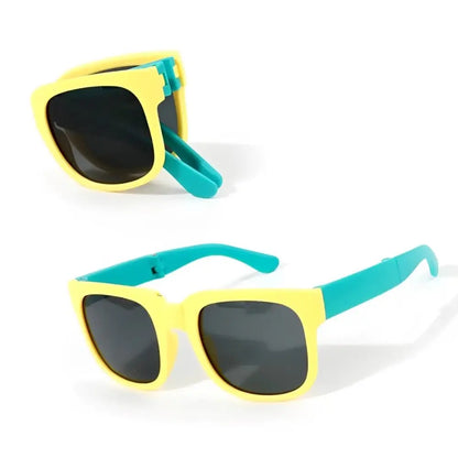 Yellow and turquoise sunglasses on a white background