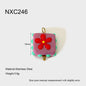 Small square pendant with a red flower design on a white background, featuring measurements and material details.